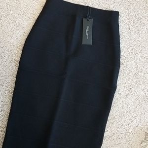 Spandex midi length black skirt